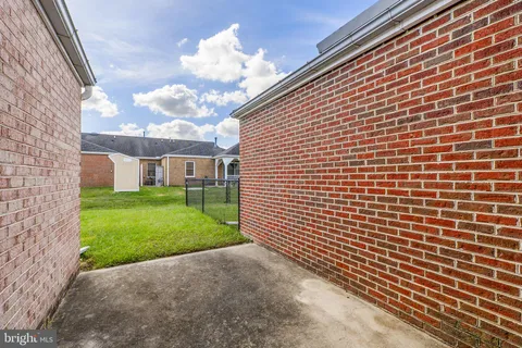 a view of a backyard with a garden