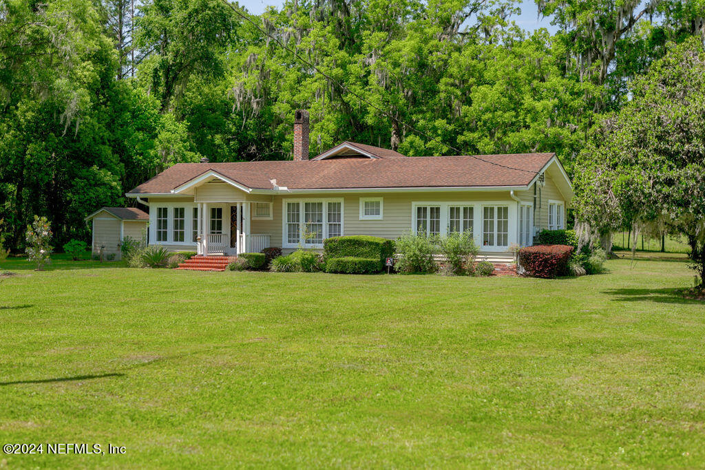 45185 Irvin Road Callahan, FL 32011 - Photo 3 of 87 a front view of a house with a yard