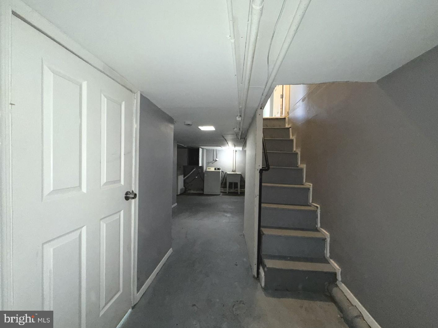 724 East 37th Street Baltimore, MD 21218 - Photo 15 of 21 a view of entryway and hall with wooden floor