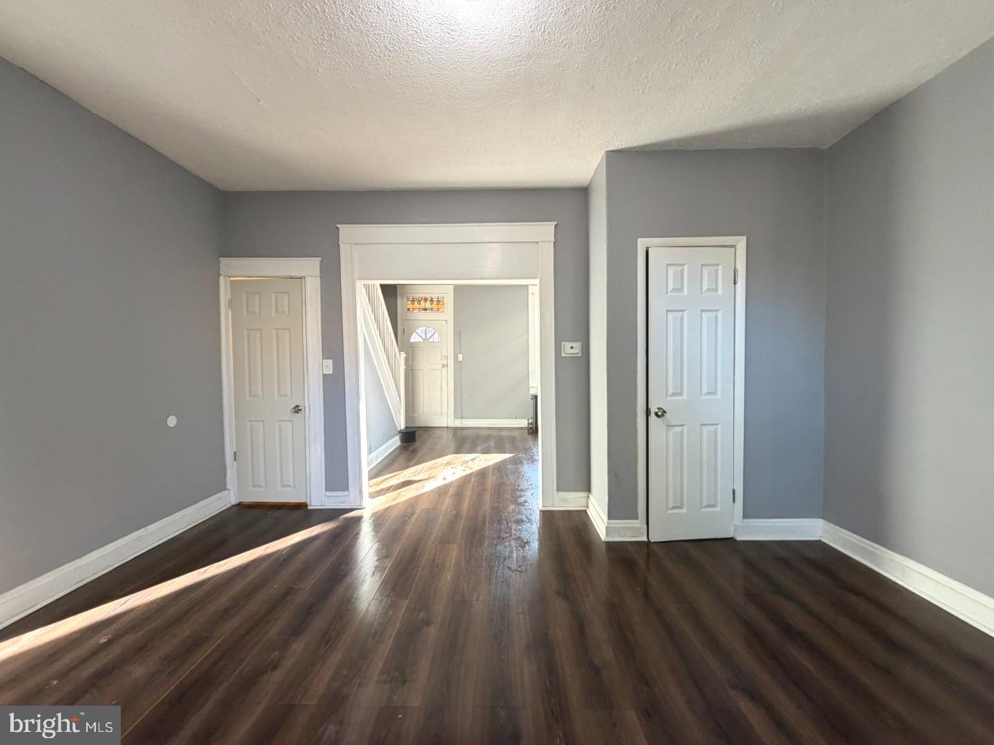 724 East 37th Street Baltimore, MD 21218 - Photo 5 of 21 a view of a hallway with wooden floor and closet