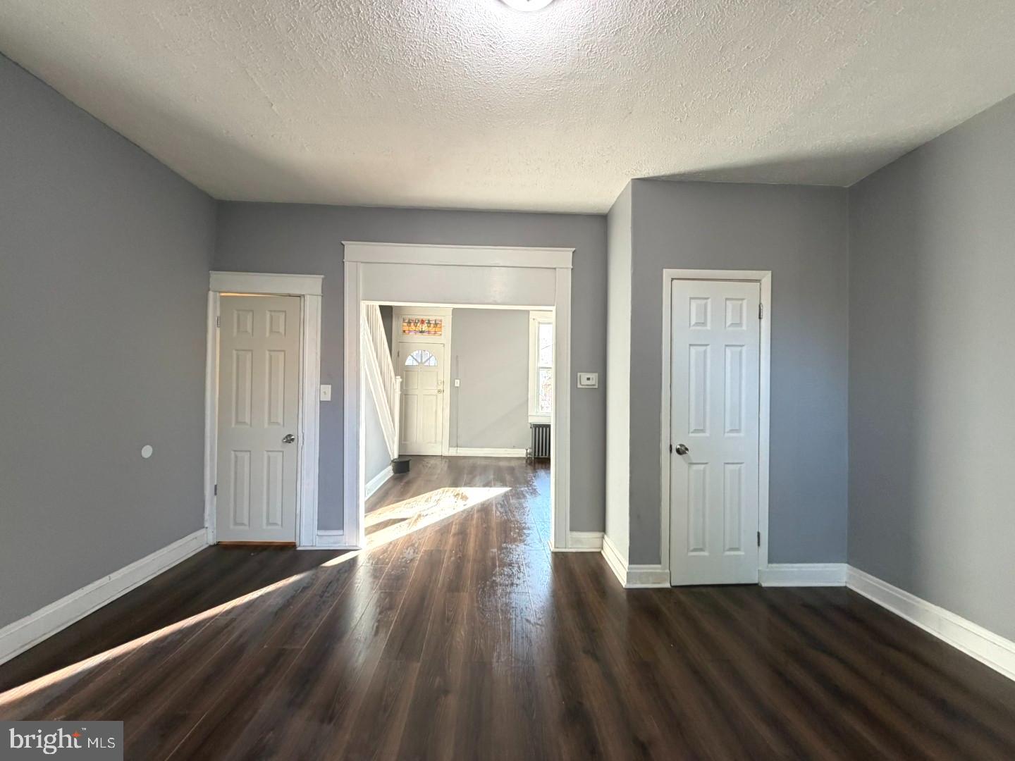 724 East 37th Street Baltimore, MD 21218 - Photo 8 of 21 a view of a hallway with wooden floor and closet
