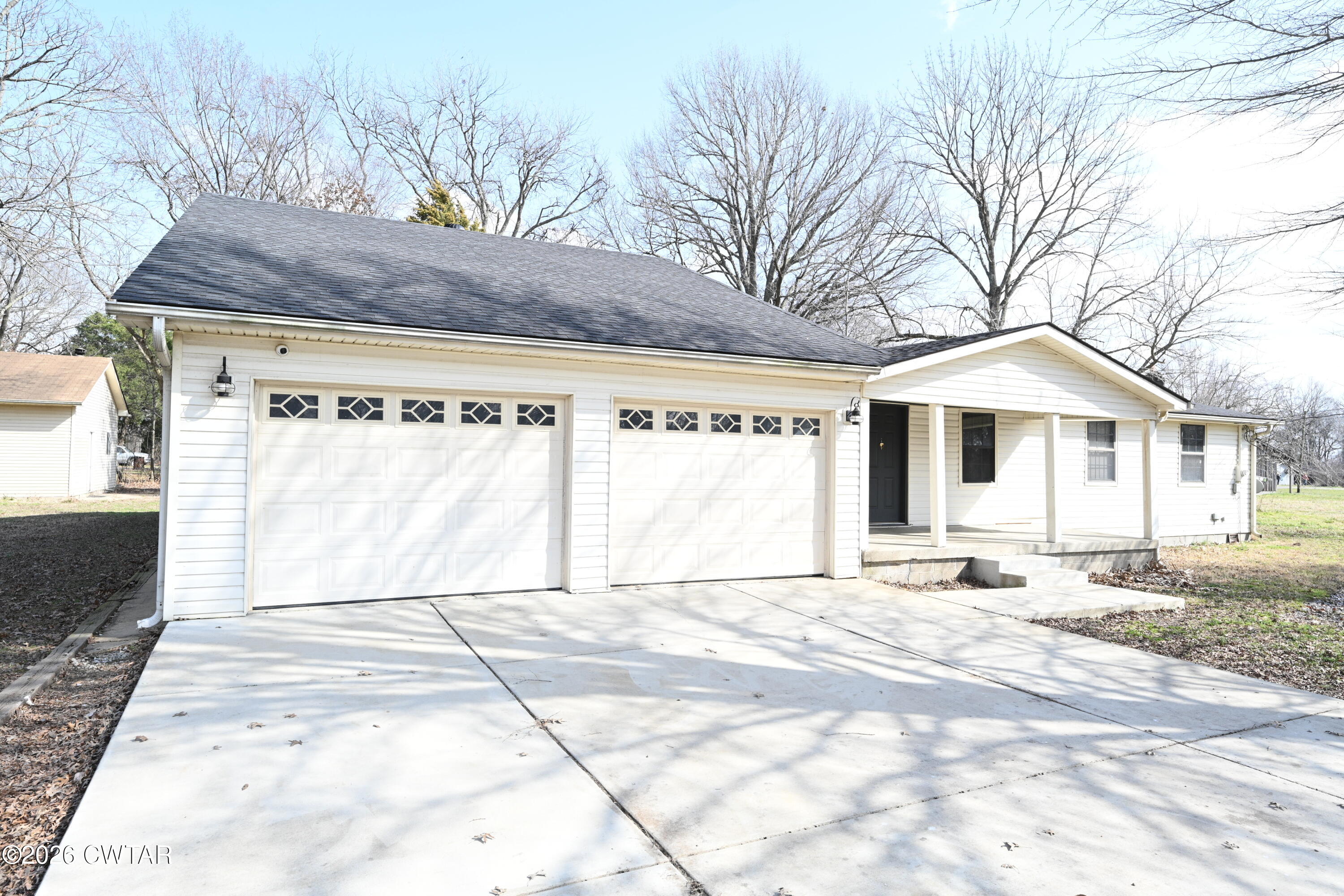 48 Miston Tank Road Ridgely, TN 38080 - Photo 16 of 18 a view of a house with a snow in the yard