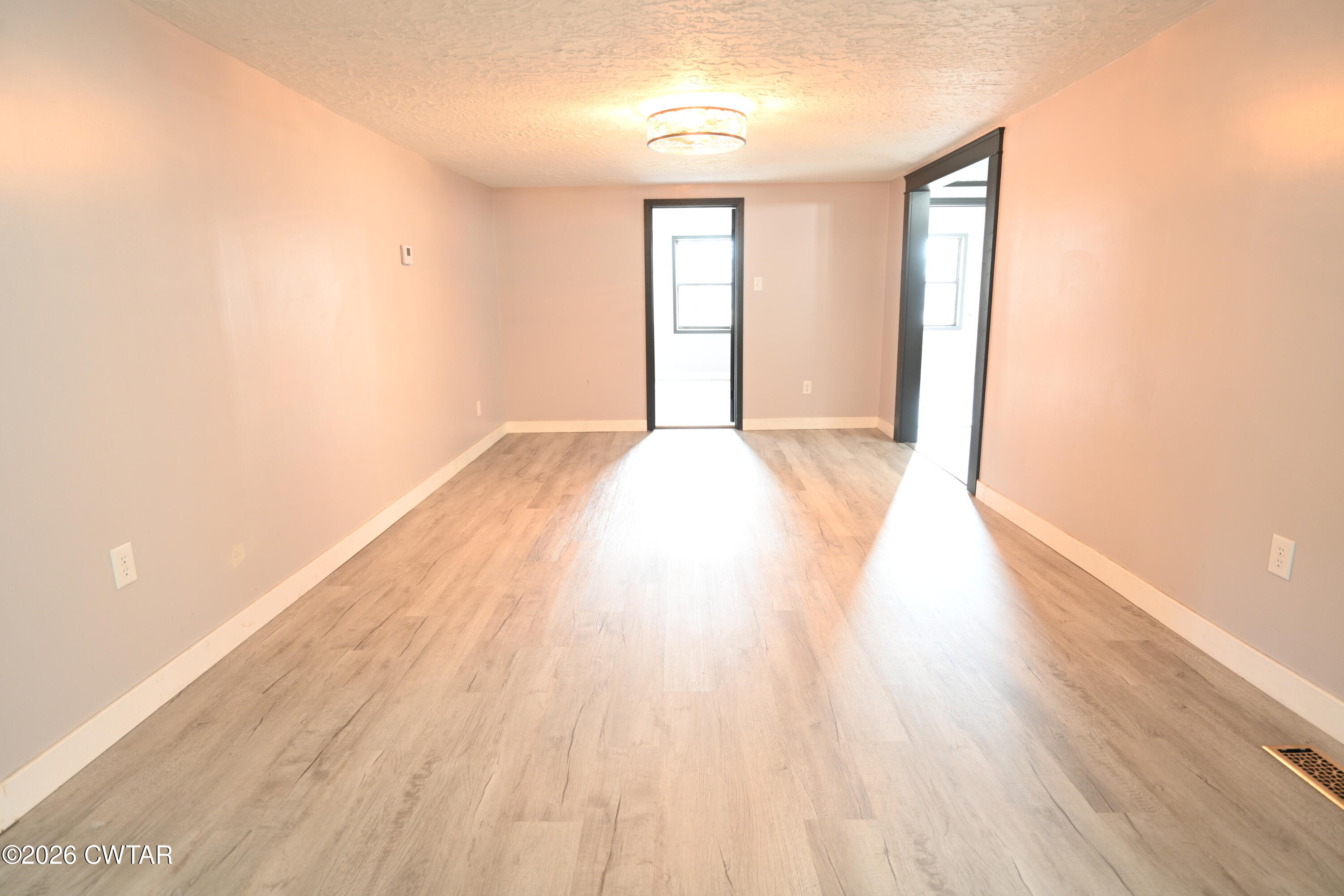 48 Miston Tank Road Ridgely, TN 38080 - Photo 2 of 18 a view of an empty room and wooden floor