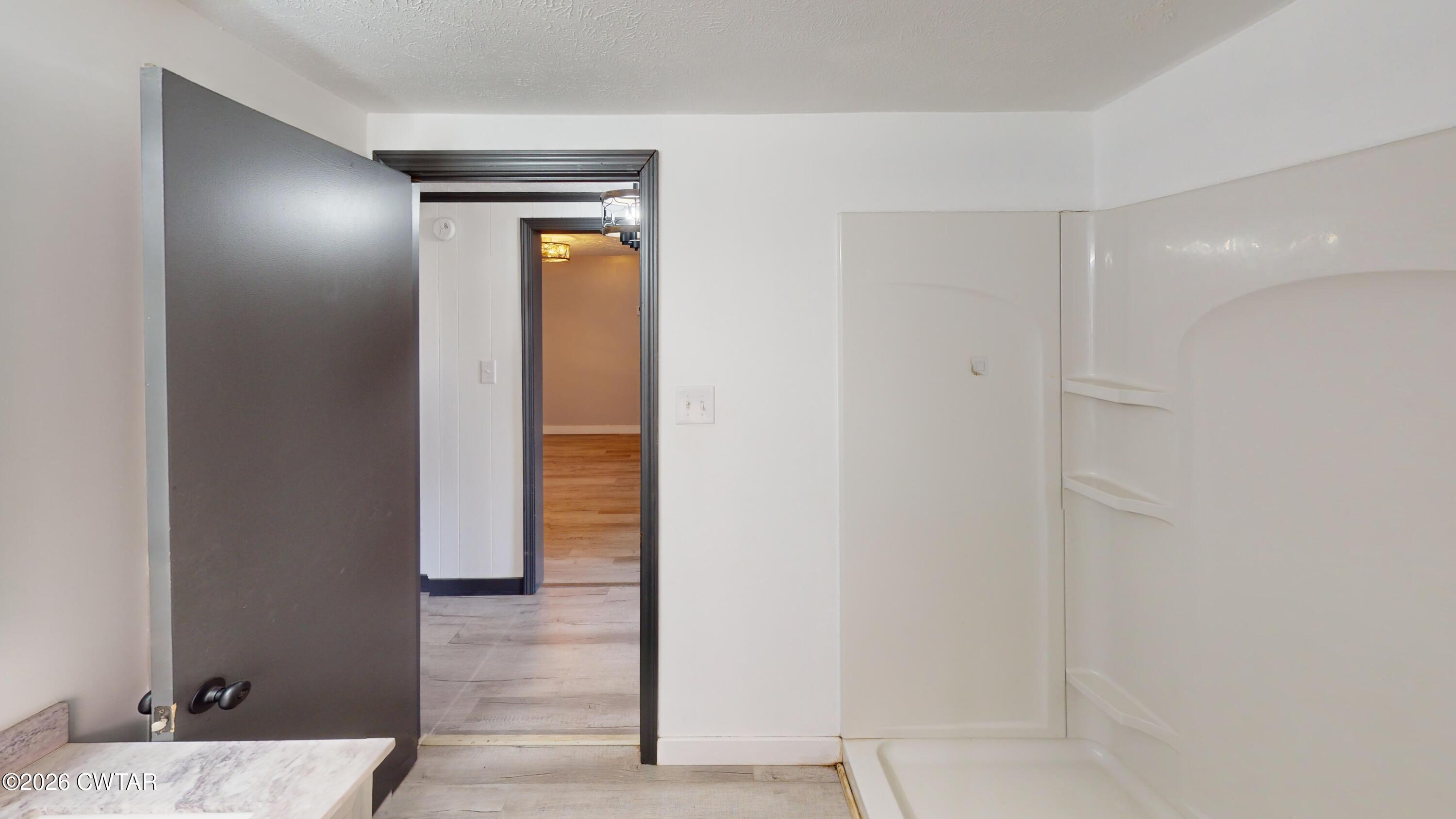 48 Miston Tank Road Ridgely, TN 38080 - Photo 5 of 18 a view of a hallway with wooden floor