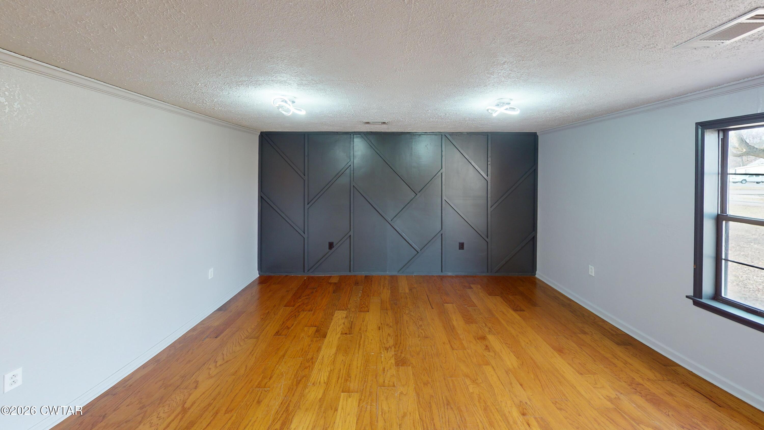 48 Miston Tank Road Ridgely, TN 38080 - Photo 8 of 18 a view of a room with a wooden floor and windows
