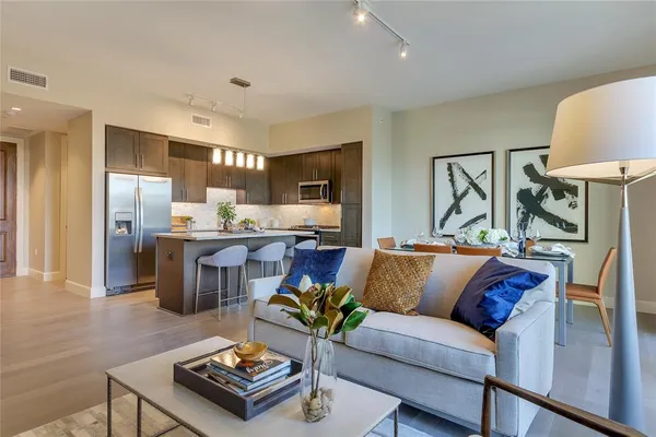 a living room with furniture and a table