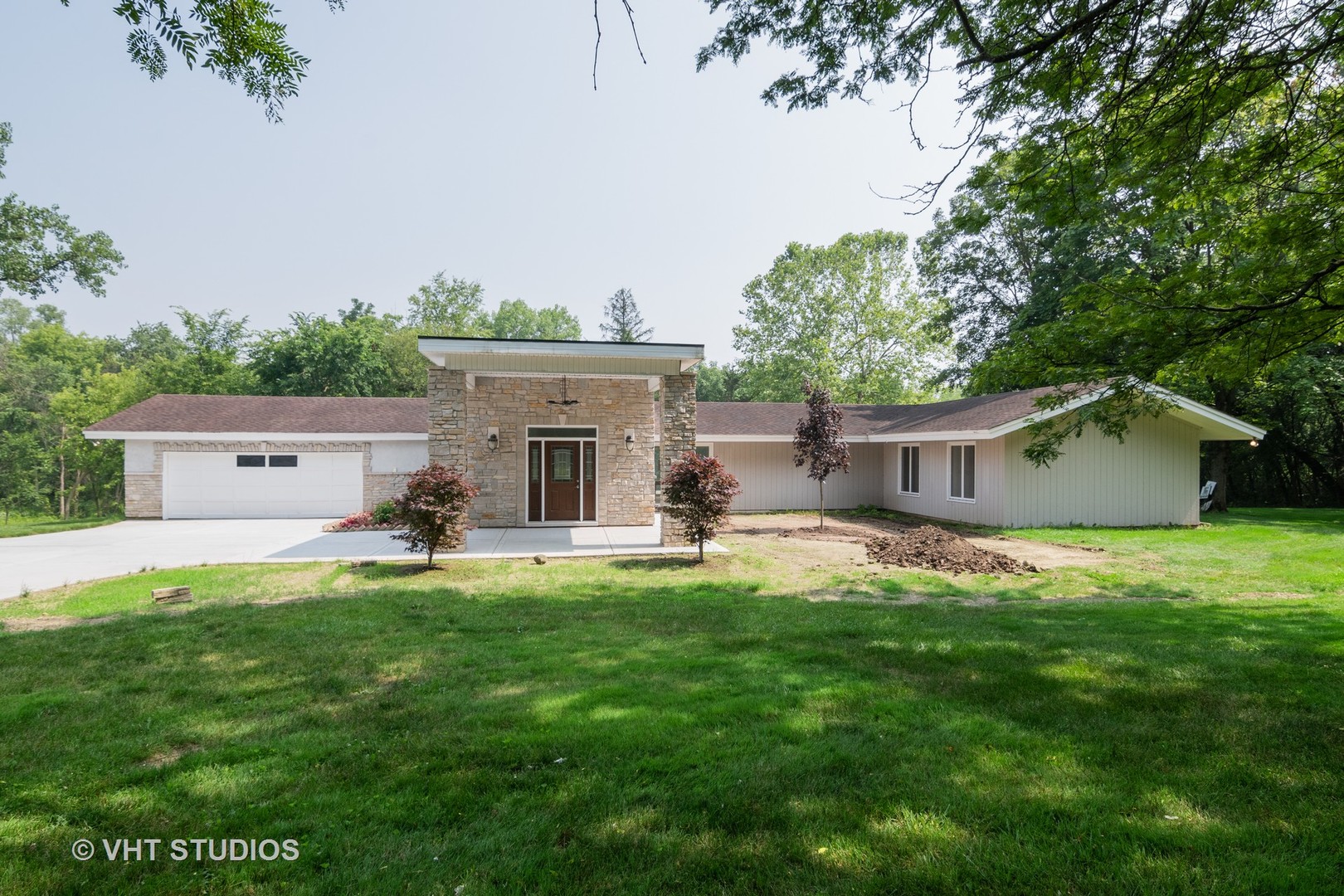 34W101 Army Trail Road Wayne, IL 60184 - Photo 1 of 20 a view of a house with backyard and sitting area