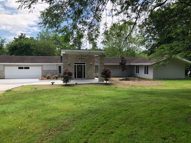 34W101 Army Trail Road Wayne, IL 60184 - Photo 19 of 20 a swimming pool with lots of trees in the background