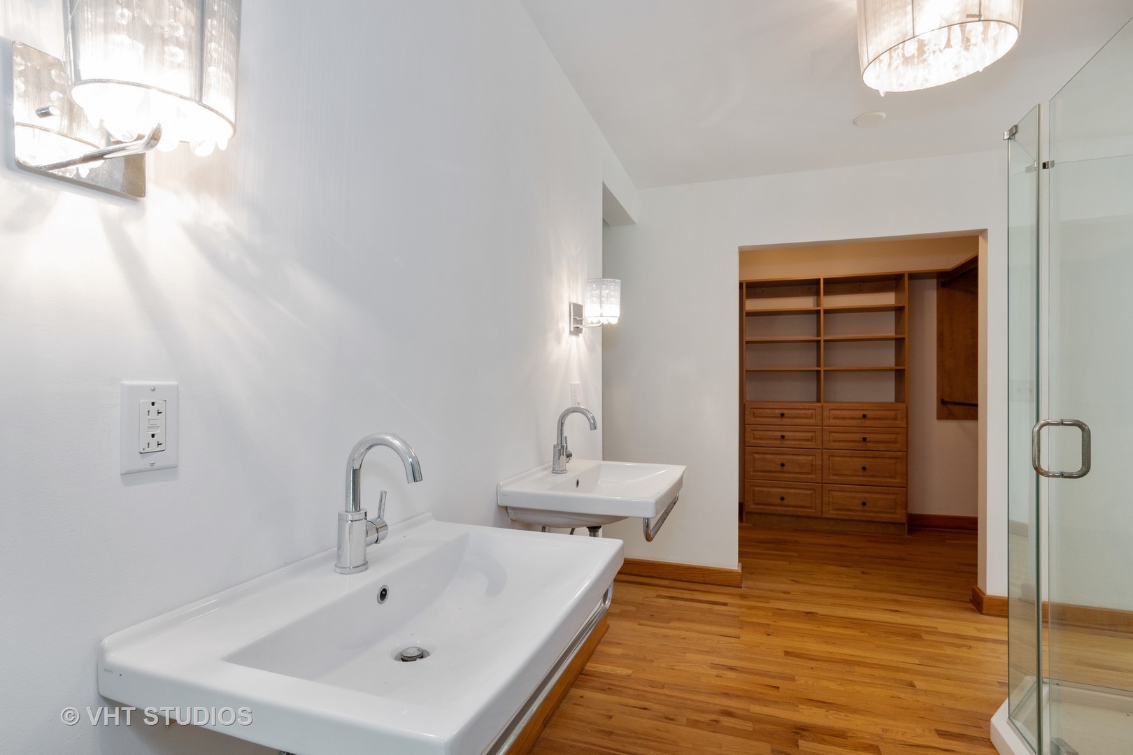 34W101 Army Trail Road Wayne, IL 60184 - Photo 8 of 20 a bathroom with a sink and a mirror
