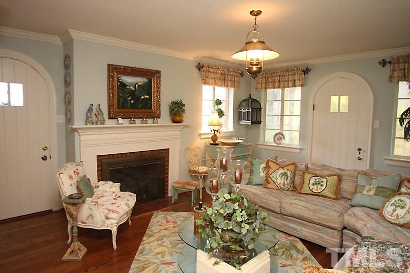 3308 Old Chapel Hill Road Durham, NC 27707 - Photo 3 of 12 a living room with furniture and a fireplace