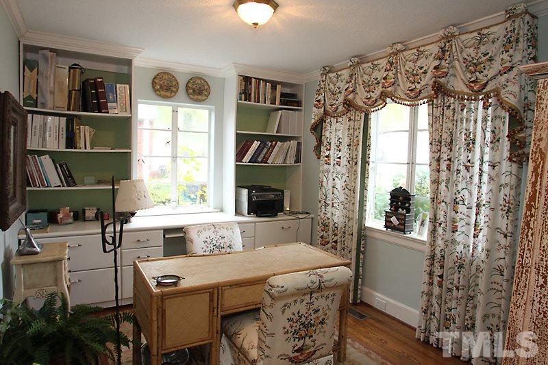 3308 Old Chapel Hill Road Durham, NC 27707 - Photo 4 of 12 a view of a workspace with furniture and a window