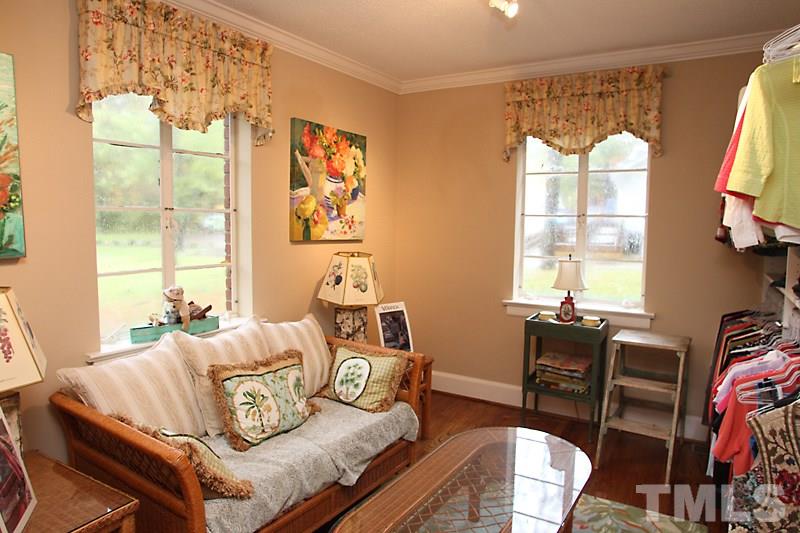 3308 Old Chapel Hill Road Durham, NC 27707 - Photo 8 of 12 a living room with furniture and a large window
