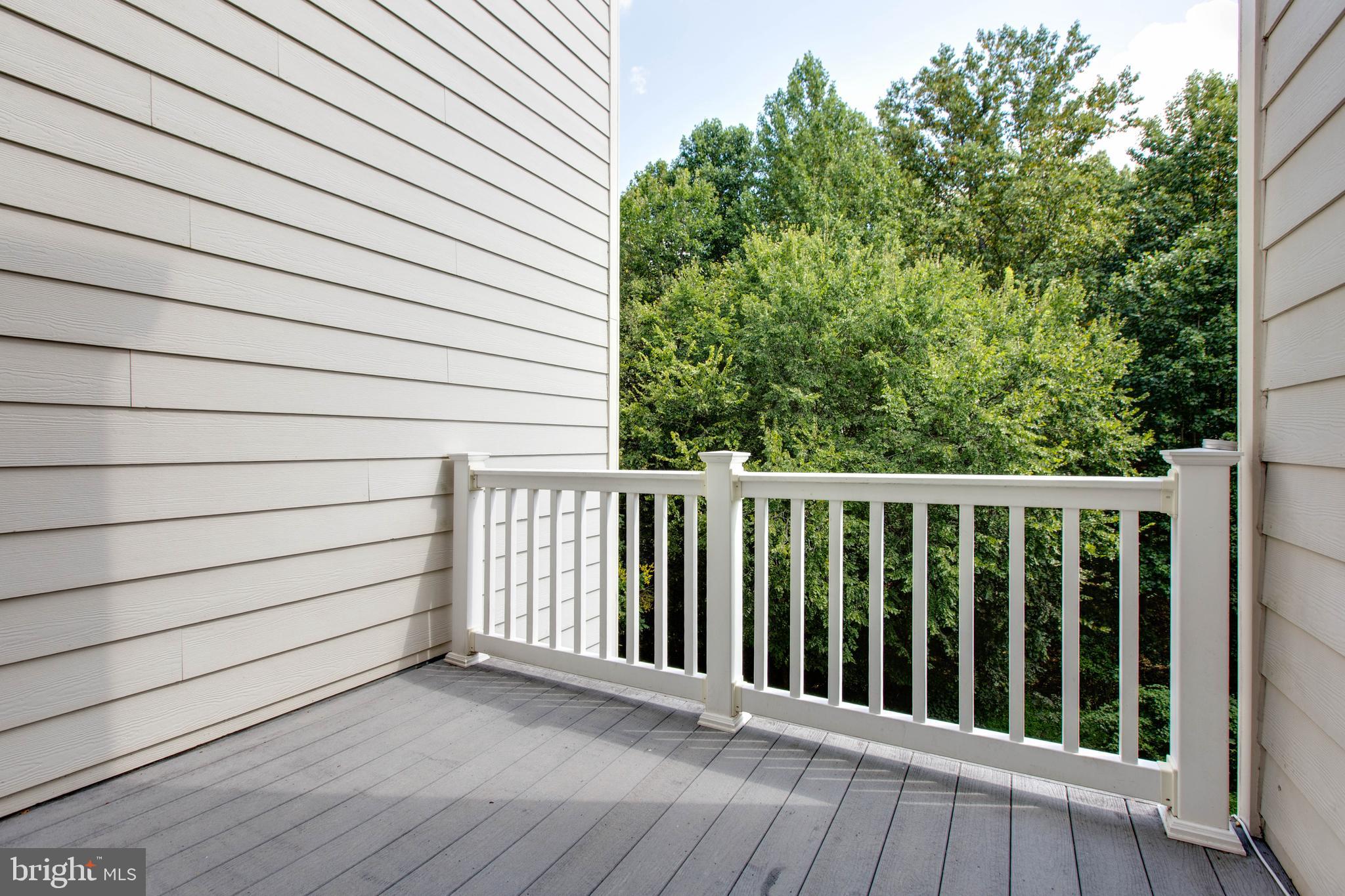 2119 Split Creek Lane Hanover, MD 21076 - Photo 19 of 55 a view of a wooden balcony