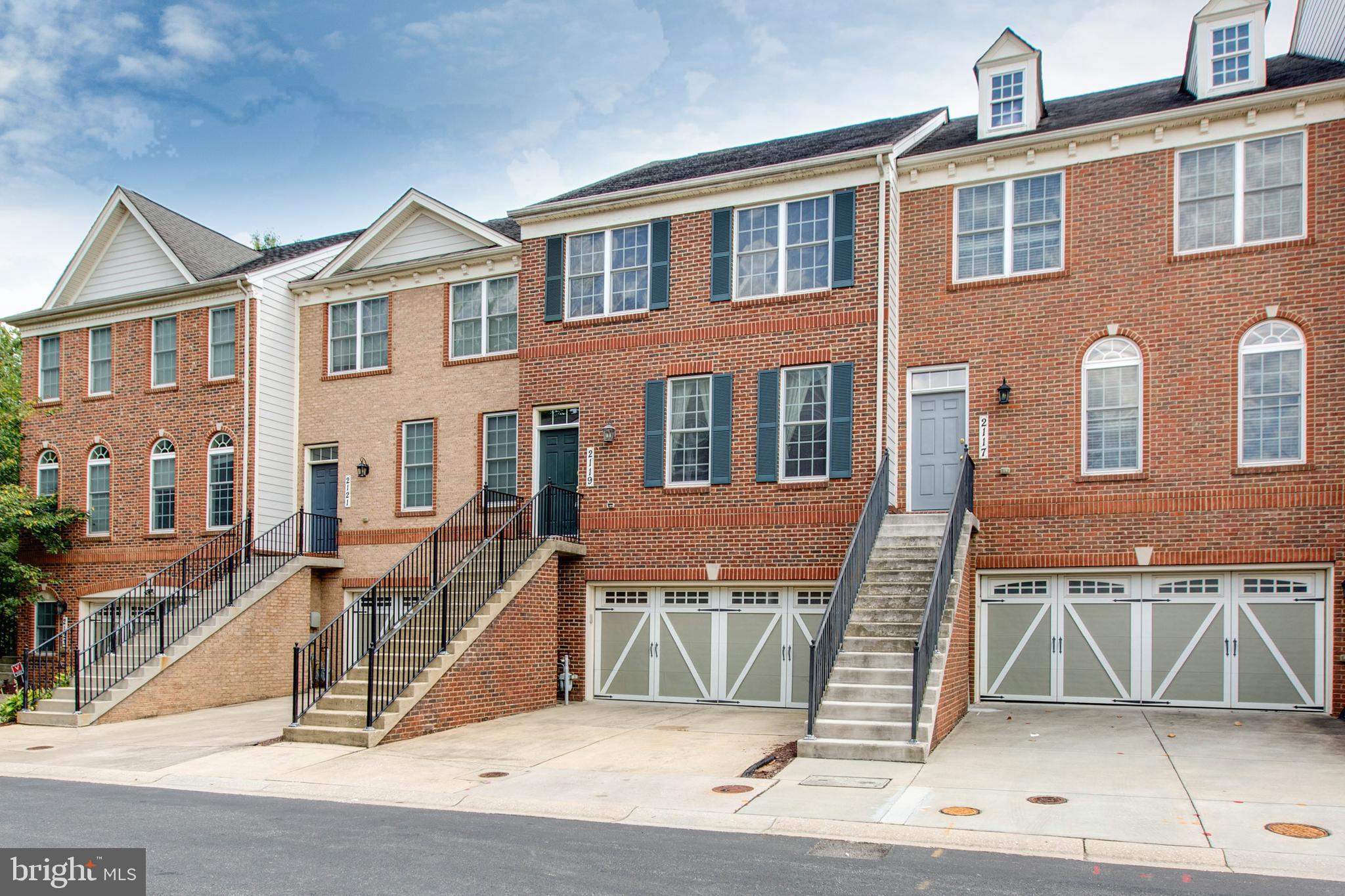 2119 Split Creek Lane Hanover, MD 21076 - Photo 2 of 55 a front view of a house with a garden