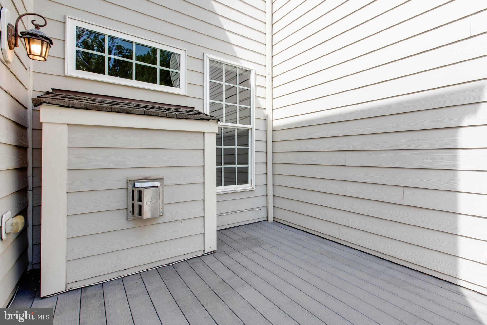 2119 Split Creek Lane Hanover, MD 21076 - Photo 22 of 55 a view of a house with a door and wooden floor