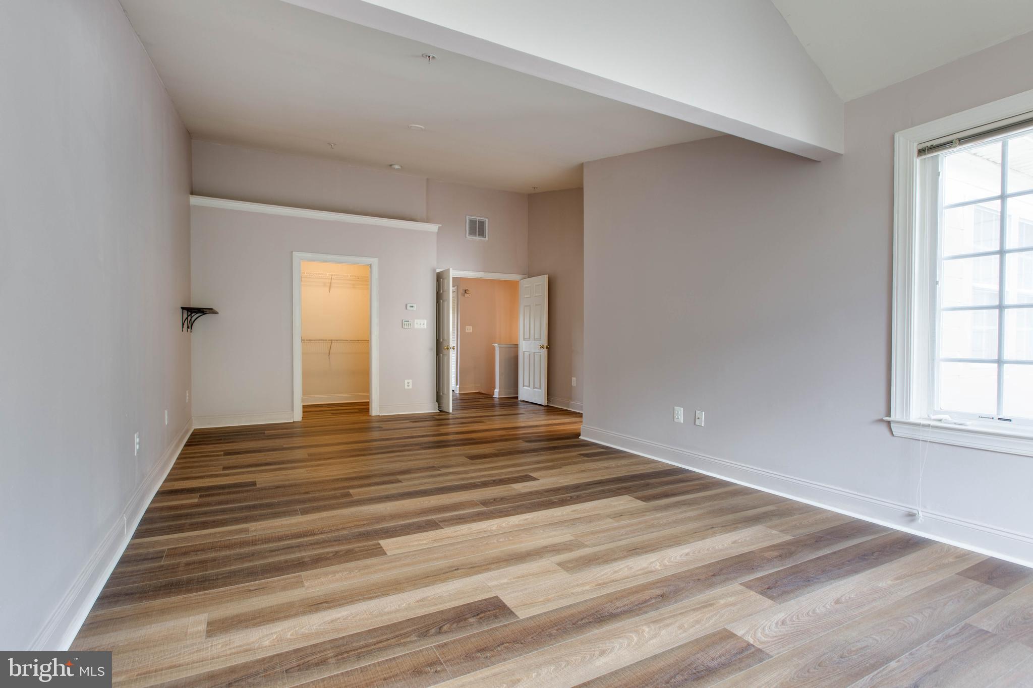 2119 Split Creek Lane Hanover, MD 21076 - Photo 25 of 55 a view of a room with wooden floor and window