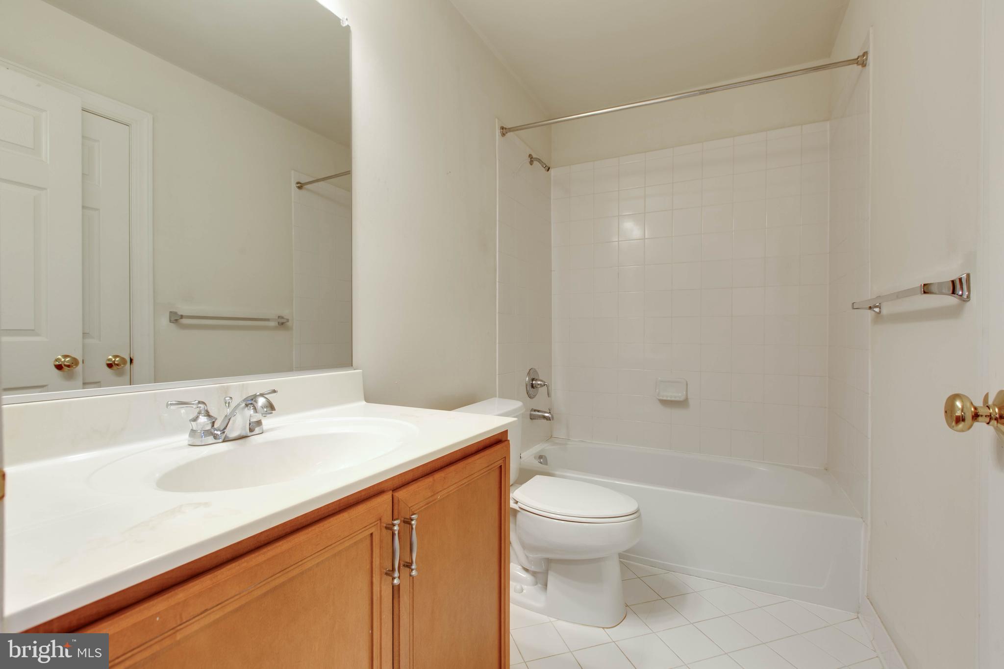 2119 Split Creek Lane Hanover, MD 21076 - Photo 31 of 55 a bathroom with a sink toilet and shower