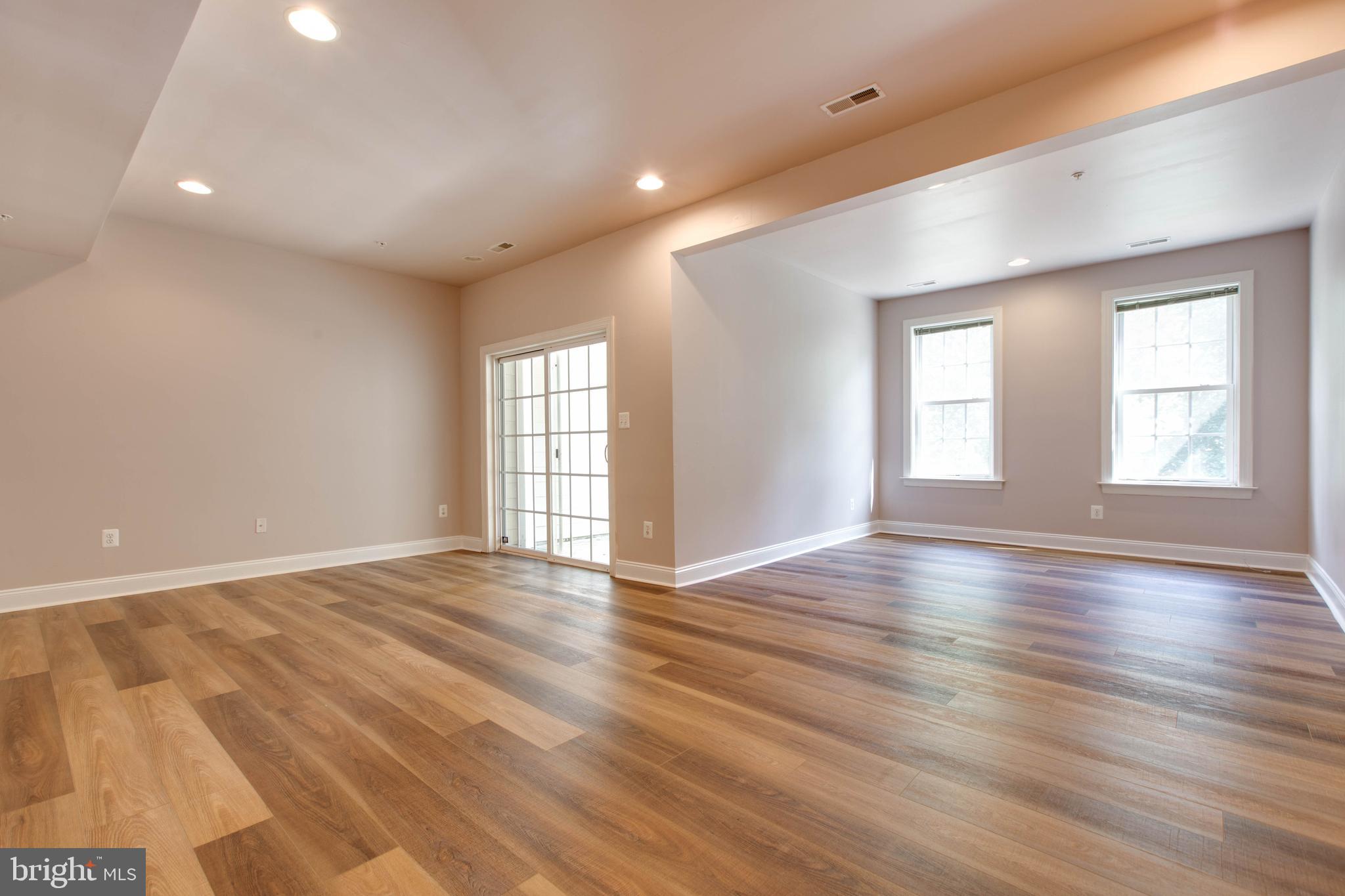 2119 Split Creek Lane Hanover, MD 21076 - Photo 37 of 55 a view of an empty room with wooden floor and window
