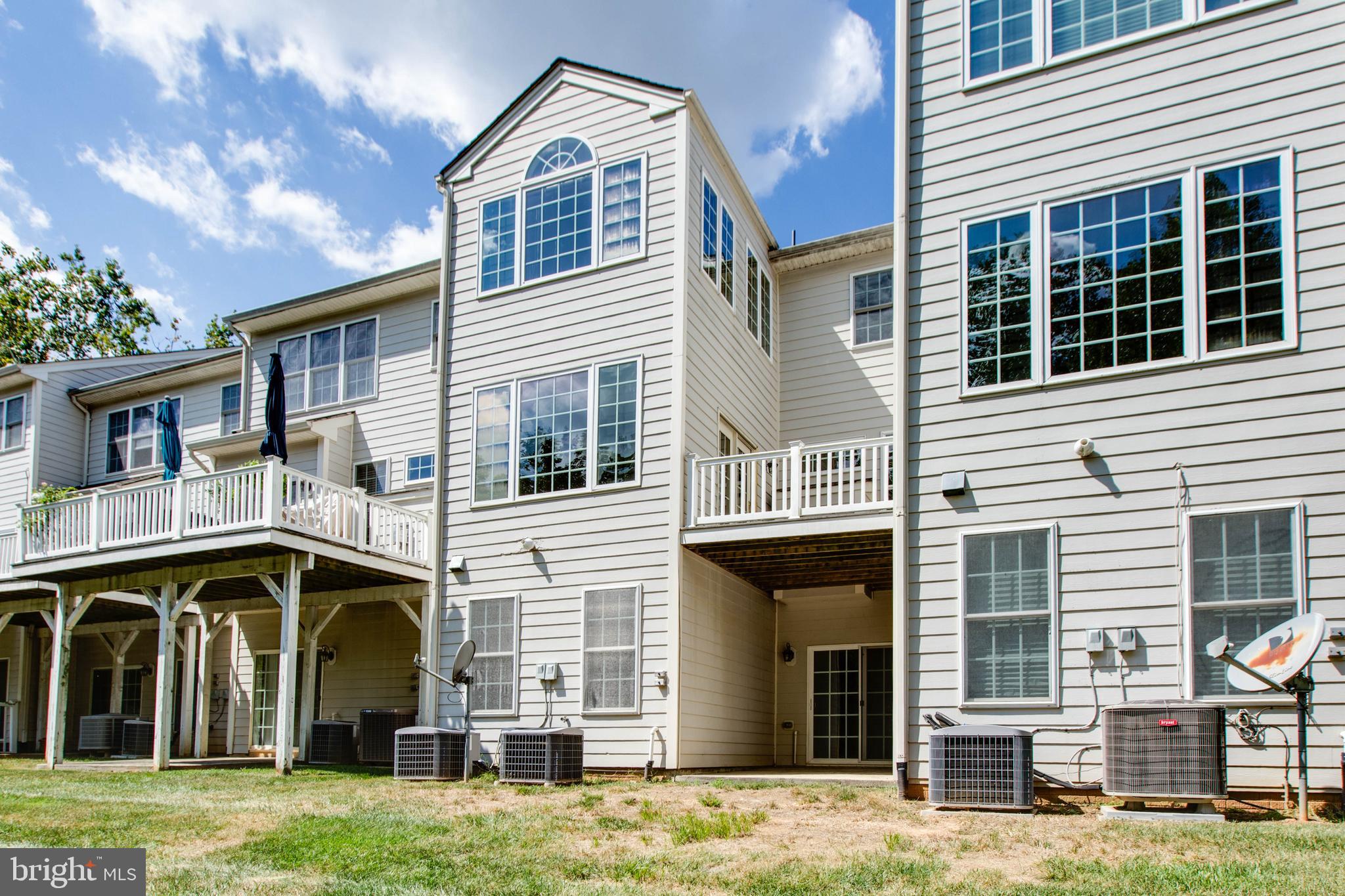 2119 Split Creek Lane Hanover, MD 21076 - Photo 45 of 55 a front view of a house with a yard