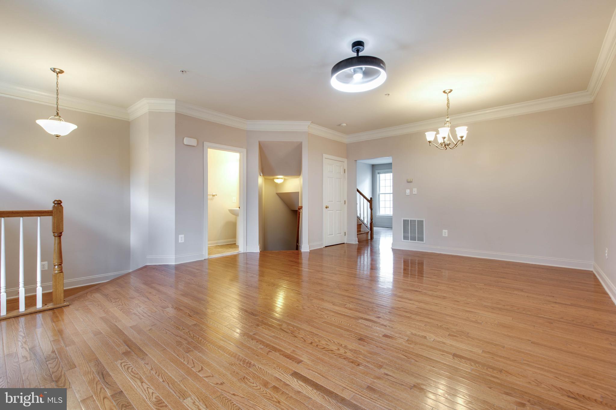 2119 Split Creek Lane Hanover, MD 21076 - Photo 6 of 55 a view of empty room with wooden floor