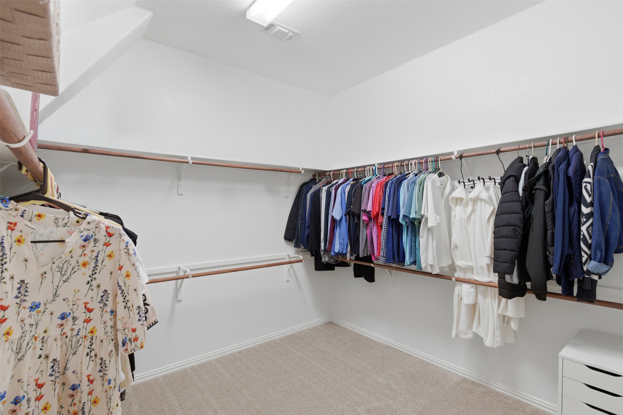 2568 Santa Barbara Loop Round Rock, TX 78665 - Photo 16 of 34 a view of walk in closet with clothes and shoes