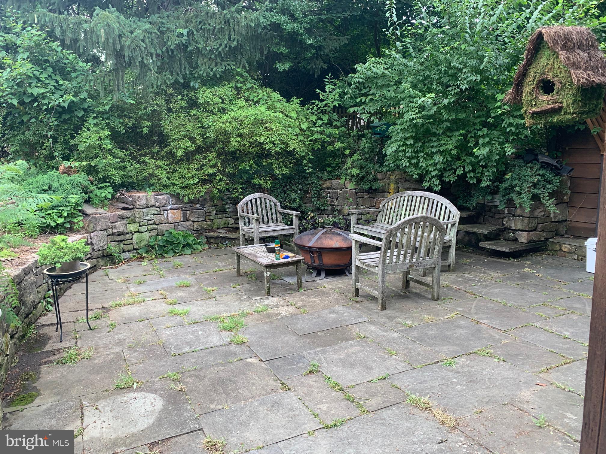 8204 Brookside Road Elkins Park, PA 19027 - Photo 15 of 20 a view of a patio with table and chairs and potted plants