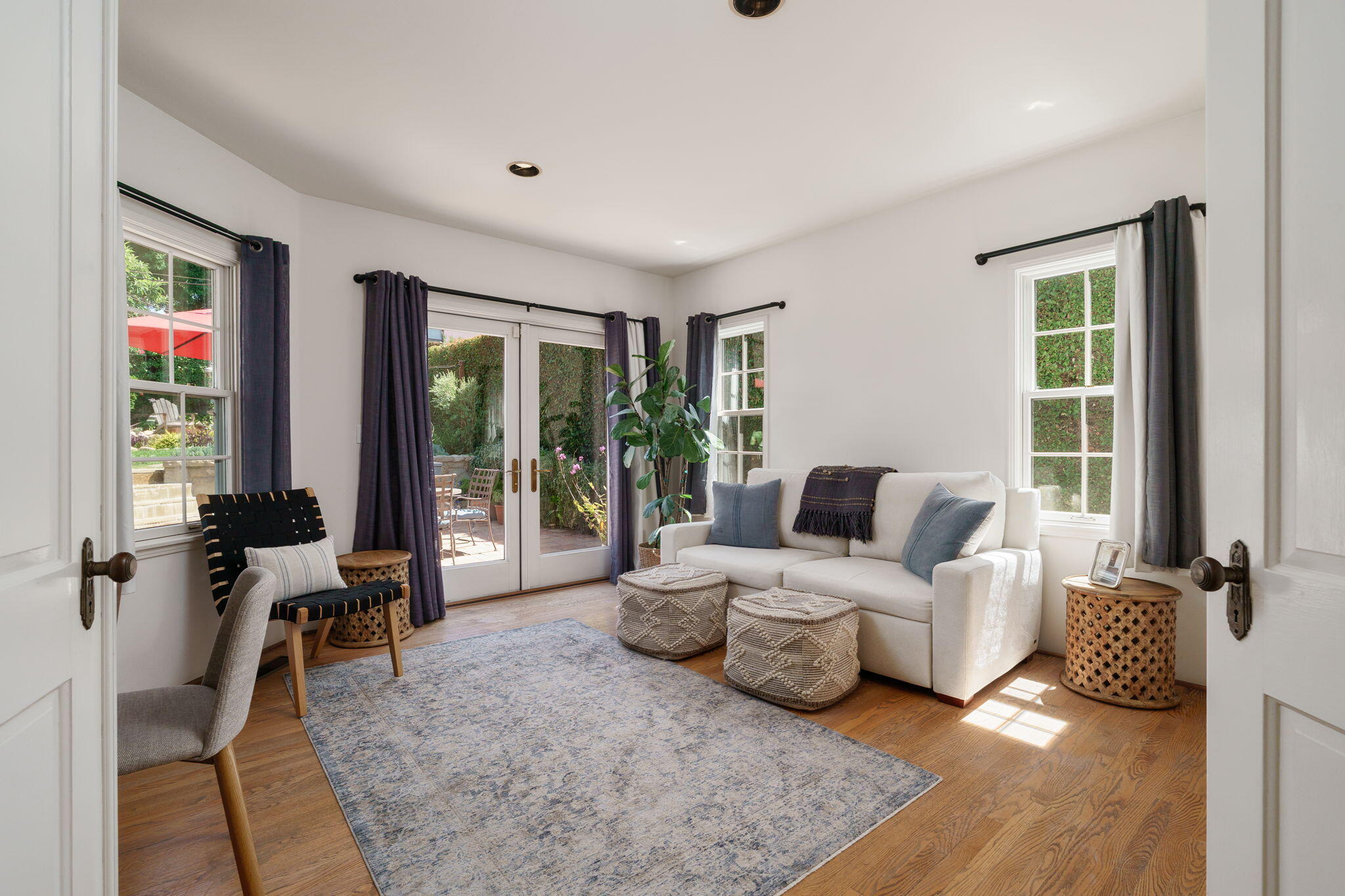 2228 Chapala Street Santa Barbara, CA 93105 - Photo 16 of 31 a living room with furniture window and wooden floor