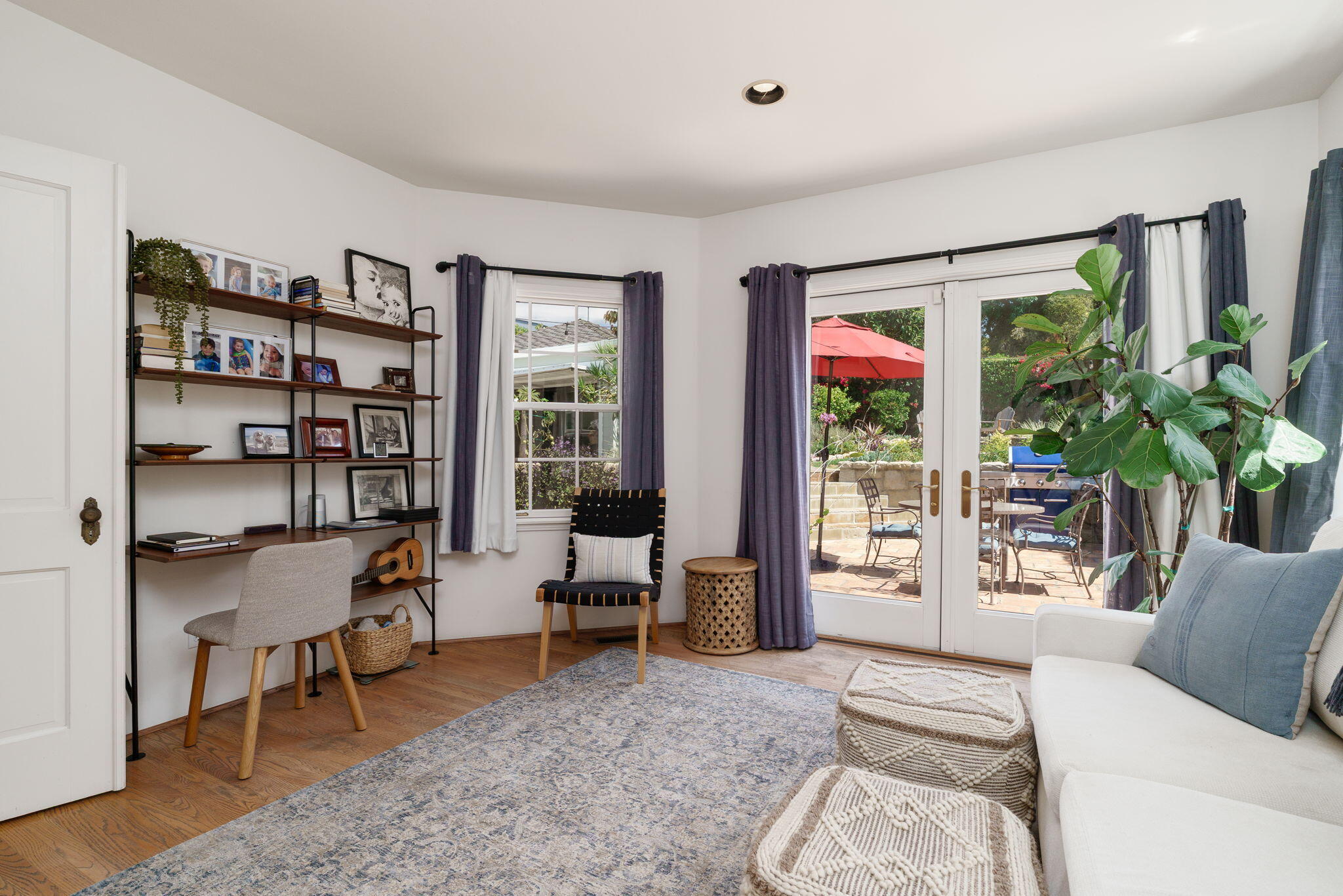 2228 Chapala Street Santa Barbara, CA 93105 - Photo 17 of 31 a living room with furniture and a potted plant