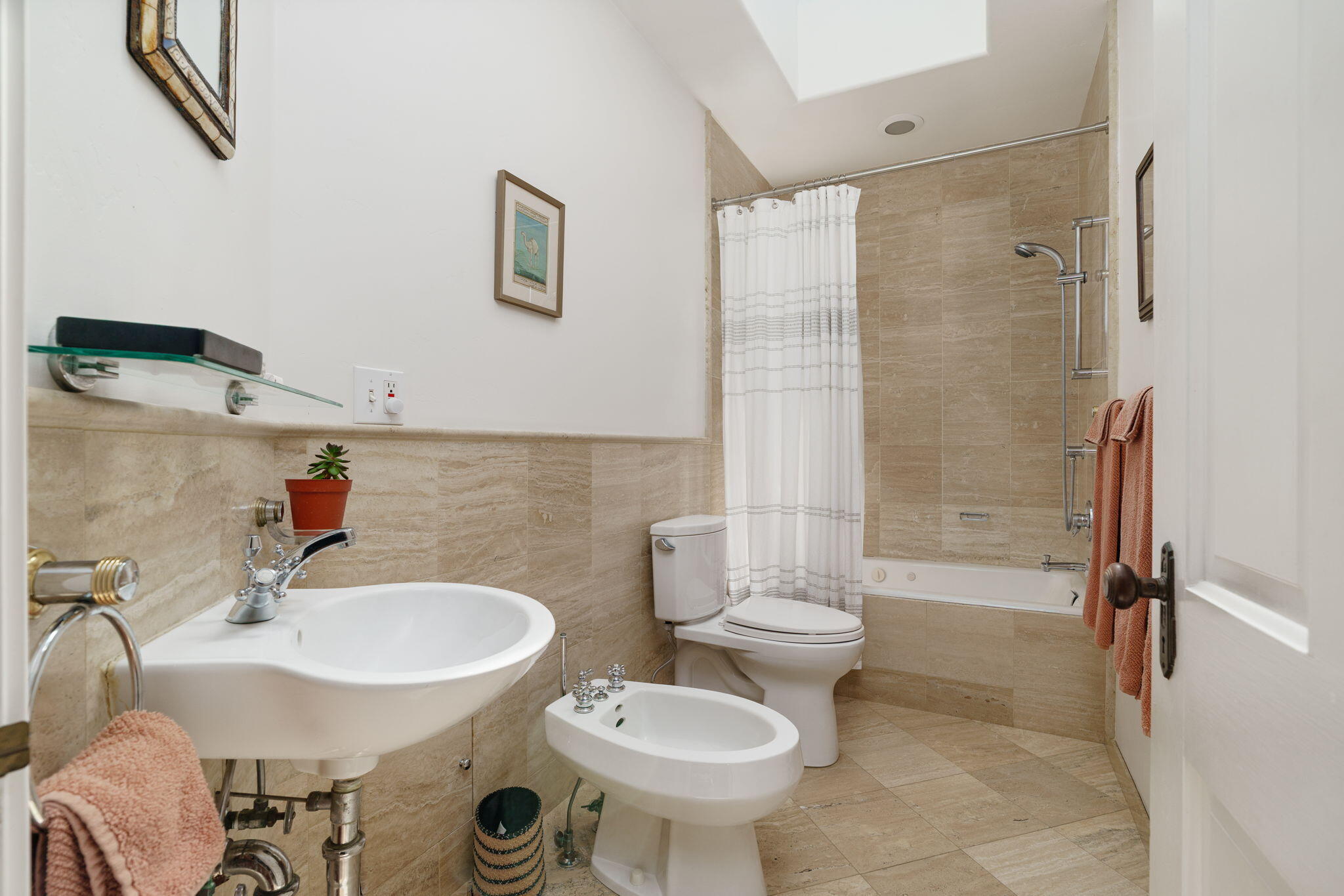 2228 Chapala Street Santa Barbara, CA 93105 - Photo 18 of 31 a bathroom with a sink toilet and shower