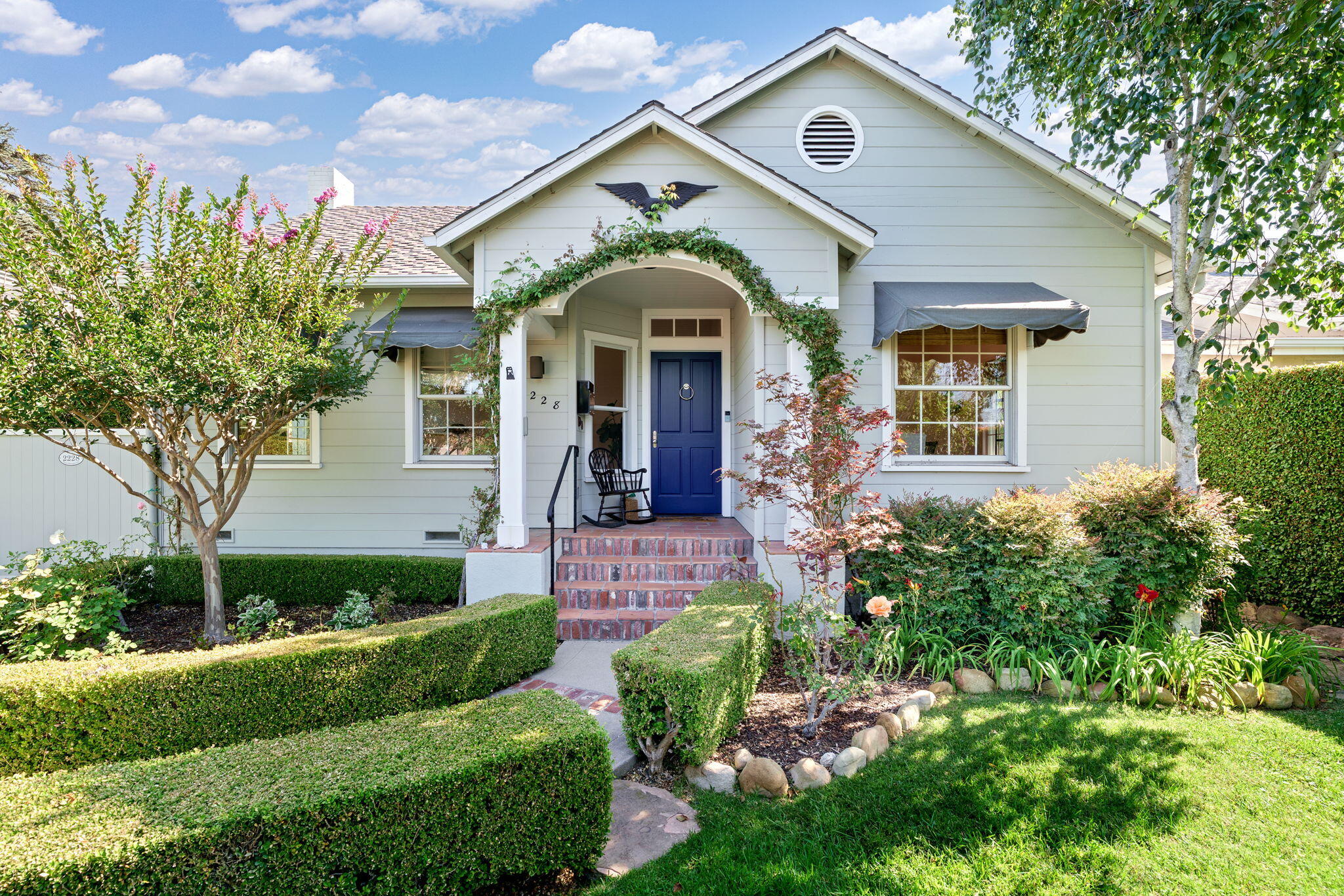 2228 Chapala Street Santa Barbara, CA 93105 - Photo 2 of 31 a front view of a house with a garden