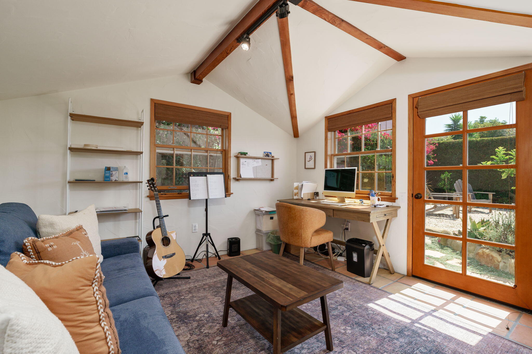 2228 Chapala Street Santa Barbara, CA 93105 - Photo 21 of 31 a living room with furniture a wooden floor and next to a window