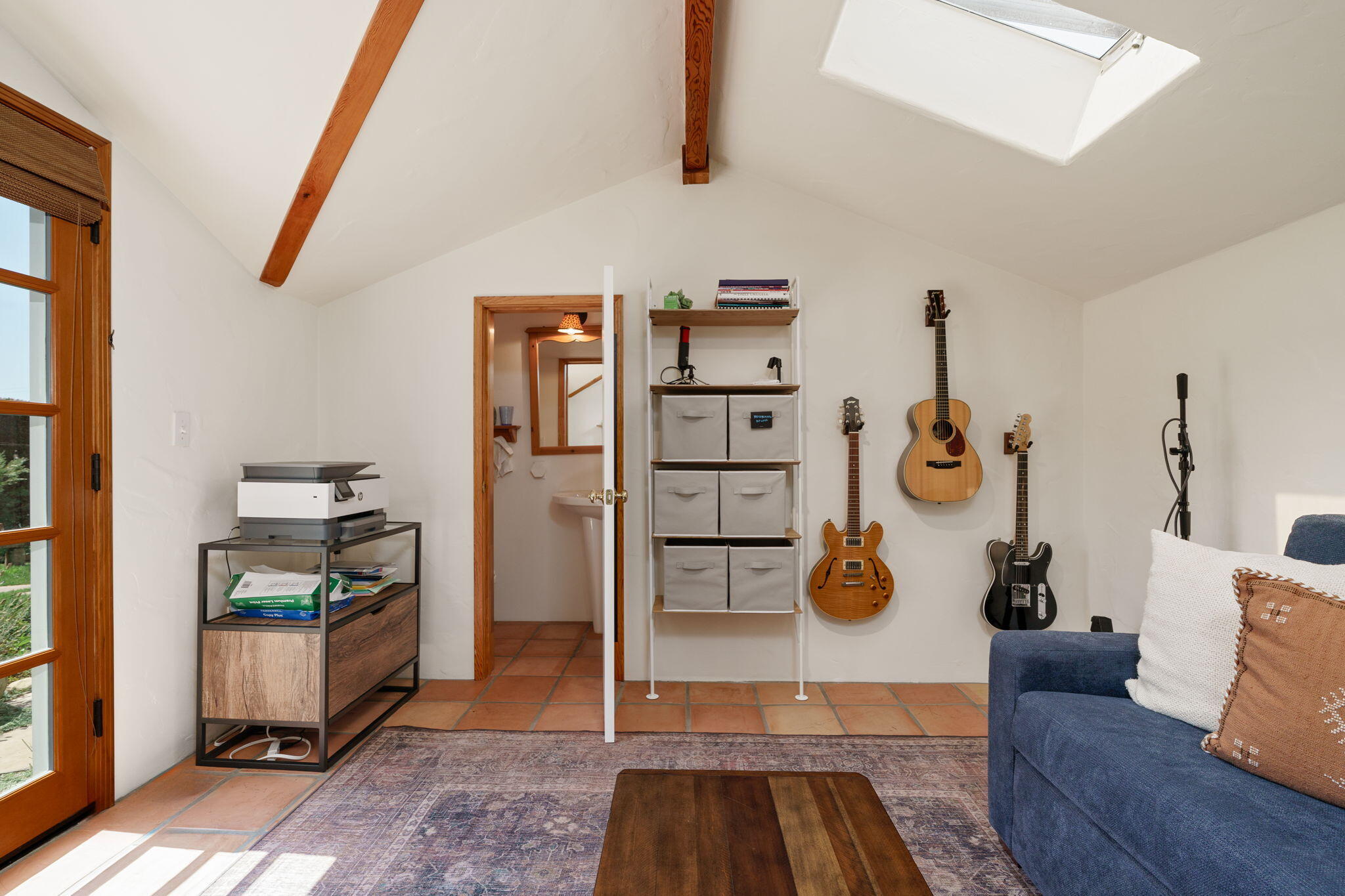 2228 Chapala Street Santa Barbara, CA 93105 - Photo 22 of 31 a kitchen with a stove and a wooden floor