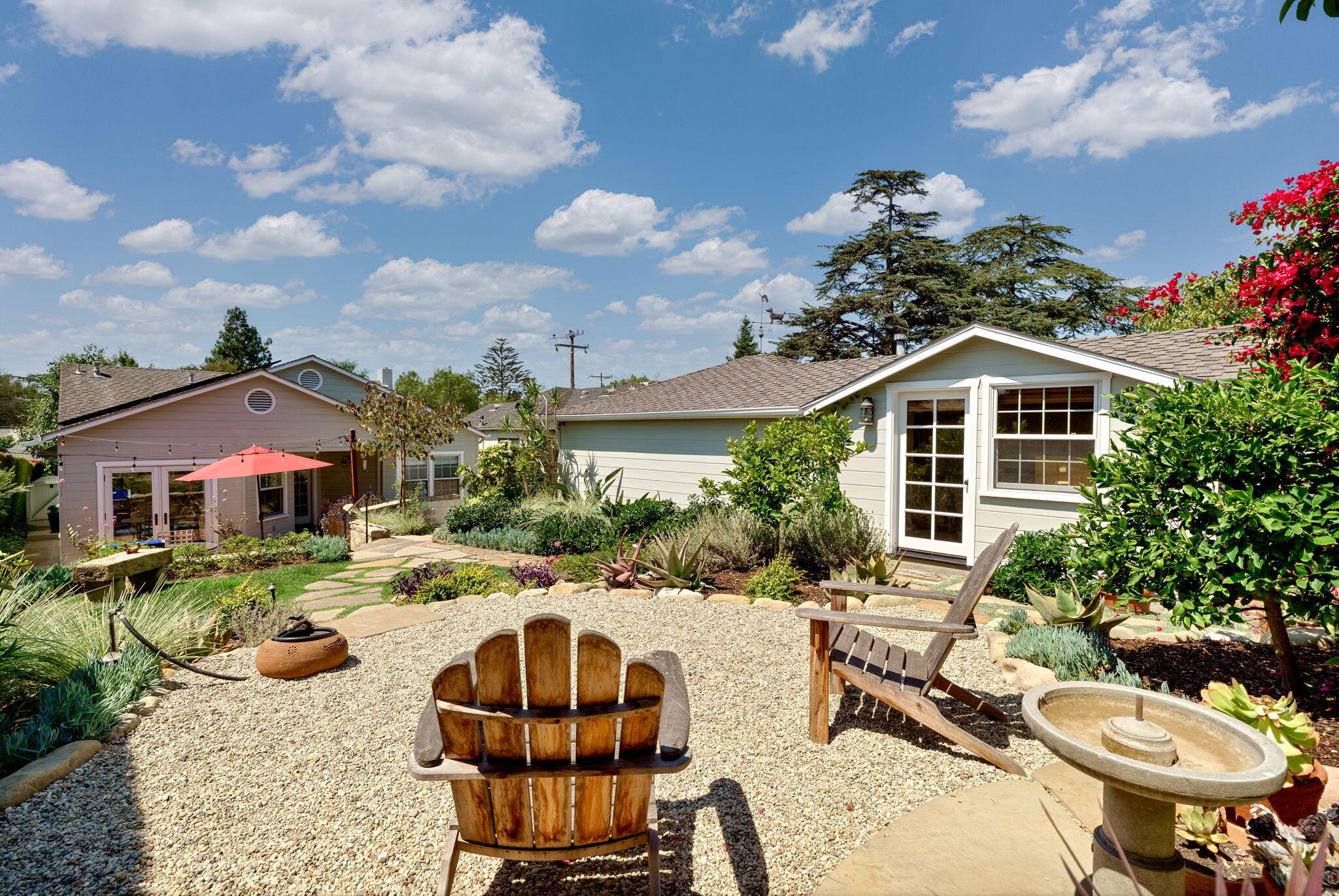 2228 Chapala Street Santa Barbara, CA 93105 - Photo 23 of 31 a view of a patio with couches table and chairs and potted plants