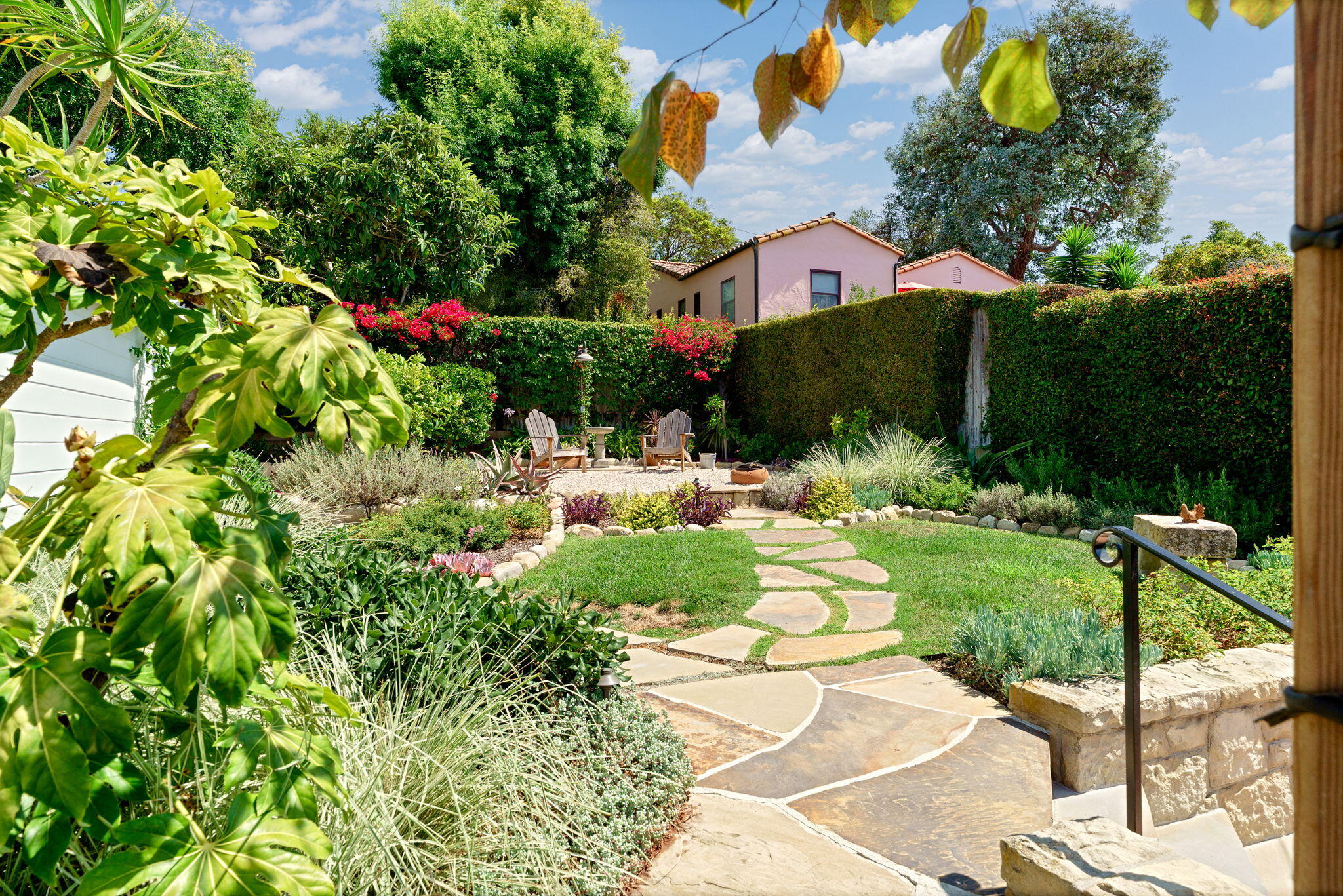 2228 Chapala Street Santa Barbara, CA 93105 - Photo 24 of 31 a view of a house with a yard and garden