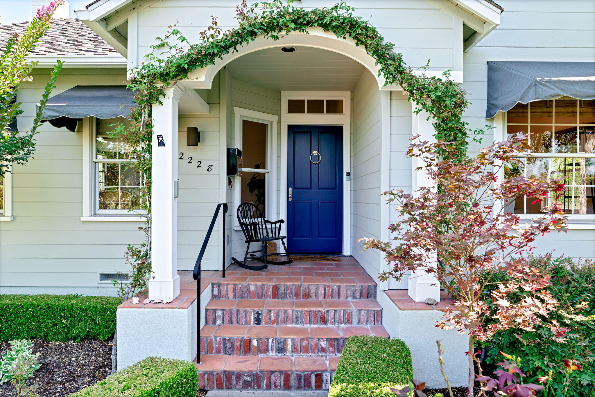 2228 Chapala Street Santa Barbara, CA 93105 - Photo 3 of 31 a front view of a house with a yard