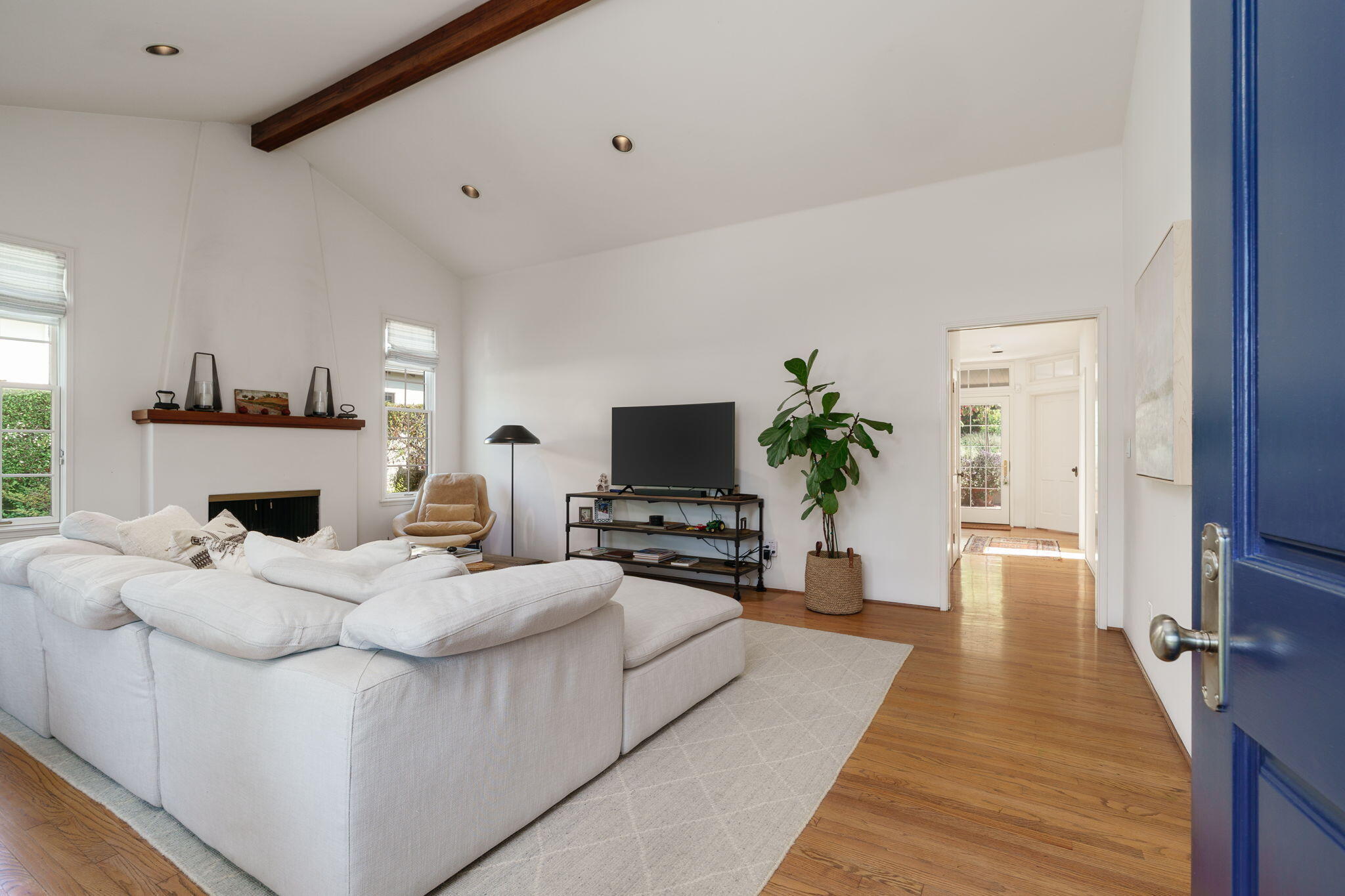 2228 Chapala Street Santa Barbara, CA 93105 - Photo 4 of 31 a living room with furniture and a flat screen tv