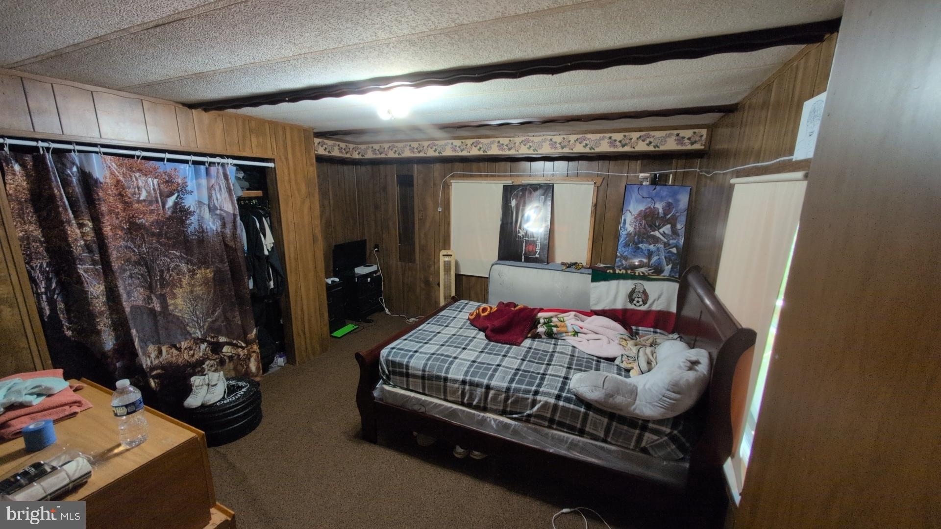 300 Horseshoe Trail Road Denver, PA 17517 - Photo 3 of 17 a bedroom with a bed and a mirror