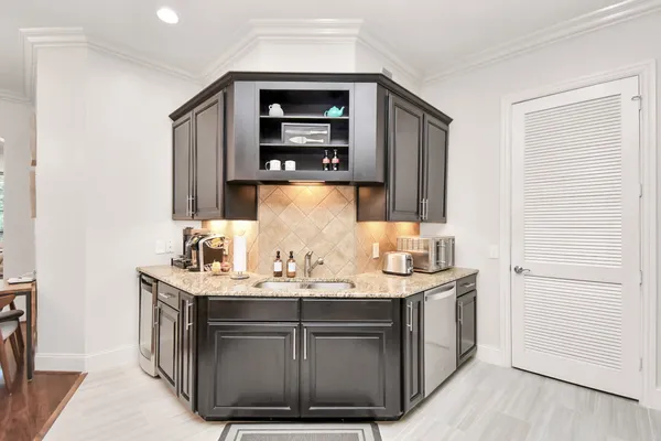 a bathroom with a sink double vanity and a mirror