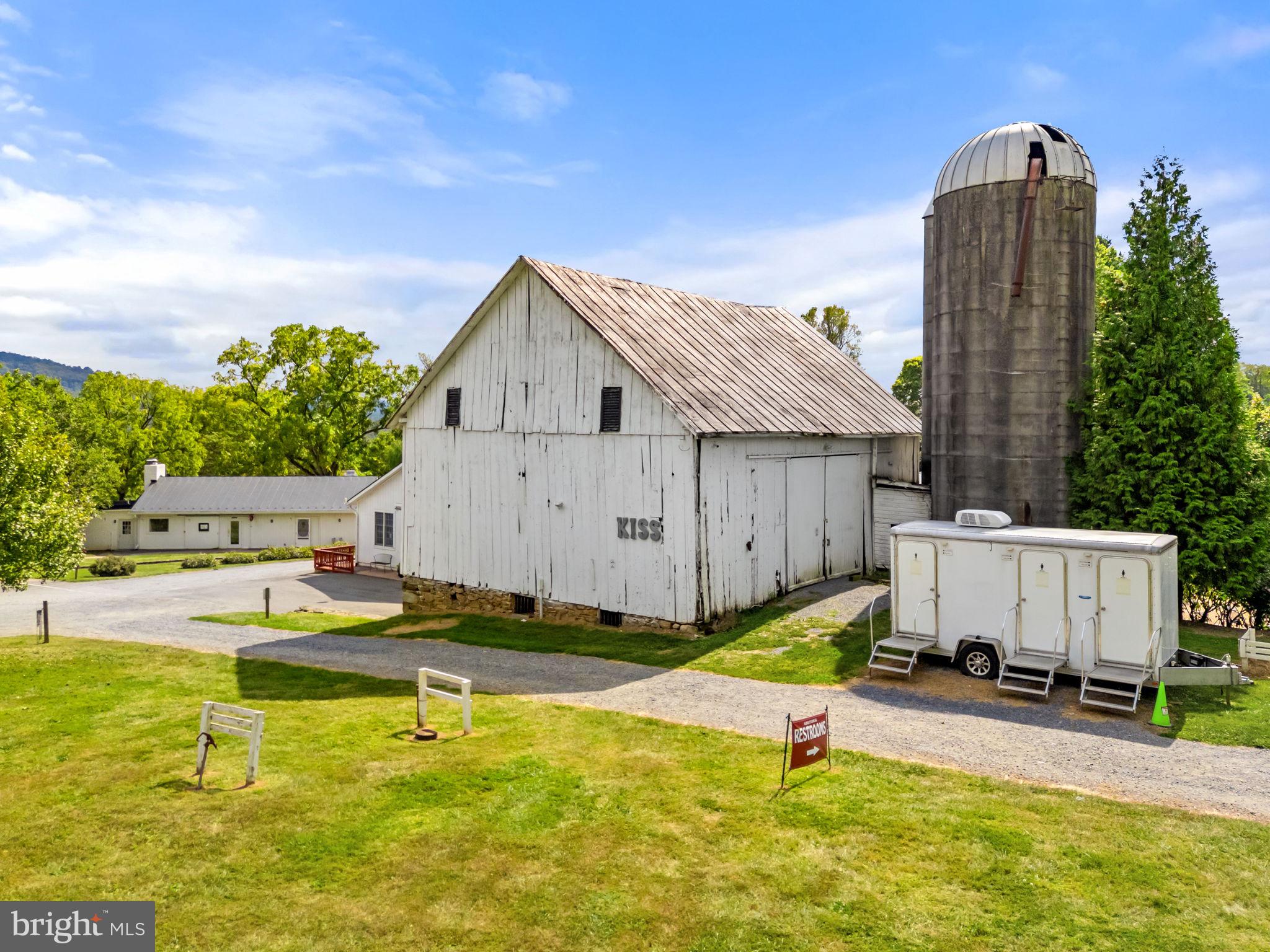 14001 Harpers Ferry Road Purcellville, VA 20132 - Photo 29 of 70 Bank barn & rolling restrooms