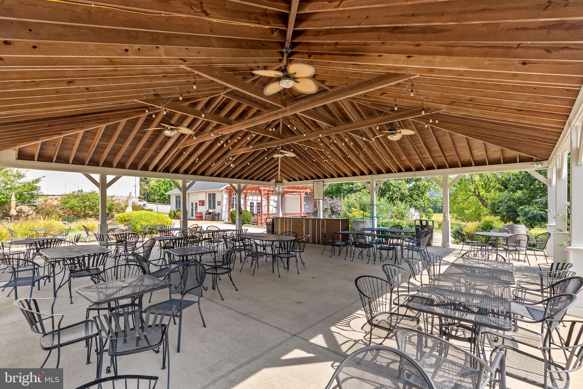14001 Harpers Ferry Road Purcellville, VA 20132 - Photo 41 of 70 The pavilion with plentiful seating and bar