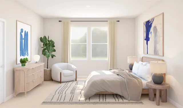 a bathroom with a sink a mirror and a potted plant