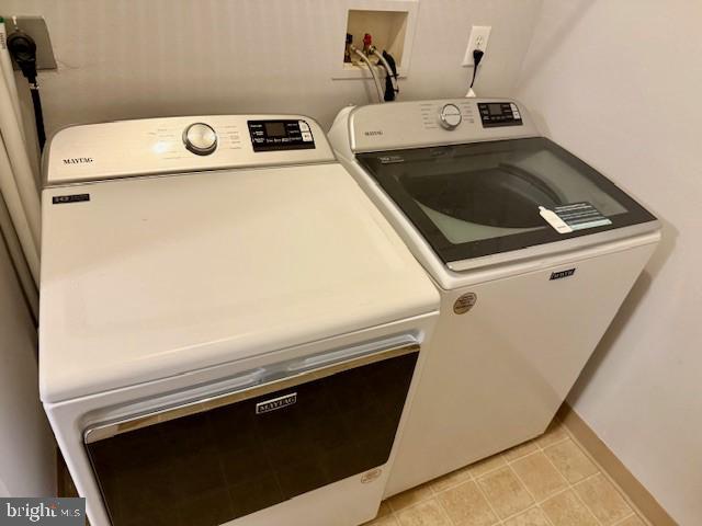 11800 Old Georgetown Road, Unit 1104 North Bethesda, MD 20852 - Photo 15 of 17 a close view of washer and dryer