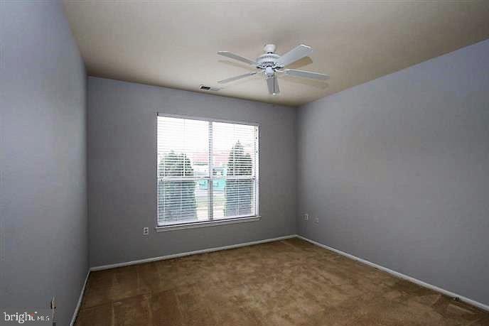 11800 Old Georgetown Road, Unit 1104 North Bethesda, MD 20852 - Photo 10 of 17 an empty room with a window