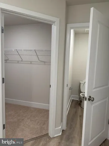 a view of a room with racks on the wall