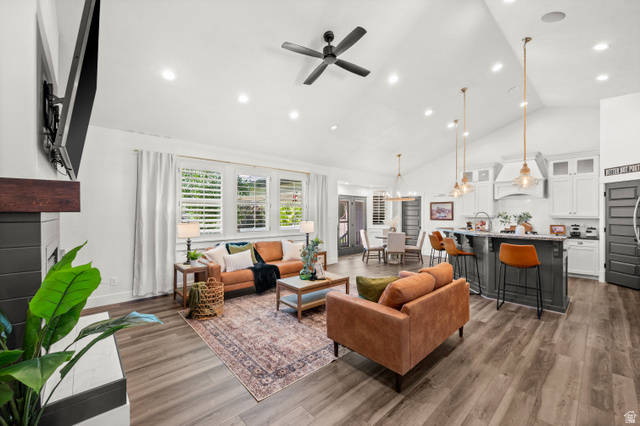 4077 Rons Court Riverton, UT 84096 - Photo 4 of 48 Beautiful plantation shutters and large windows fill the home with natural light, creating a bright and welcoming atmosphere.☀️