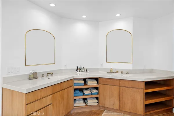 a view of a kitchen with a tub and windows