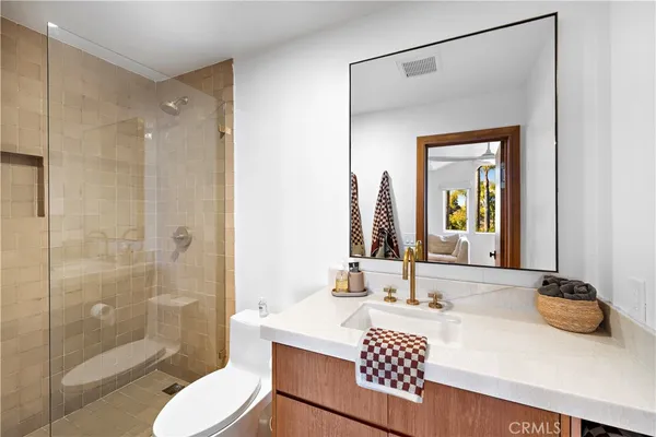 a kitchen with a stove a sink and a refrigerator