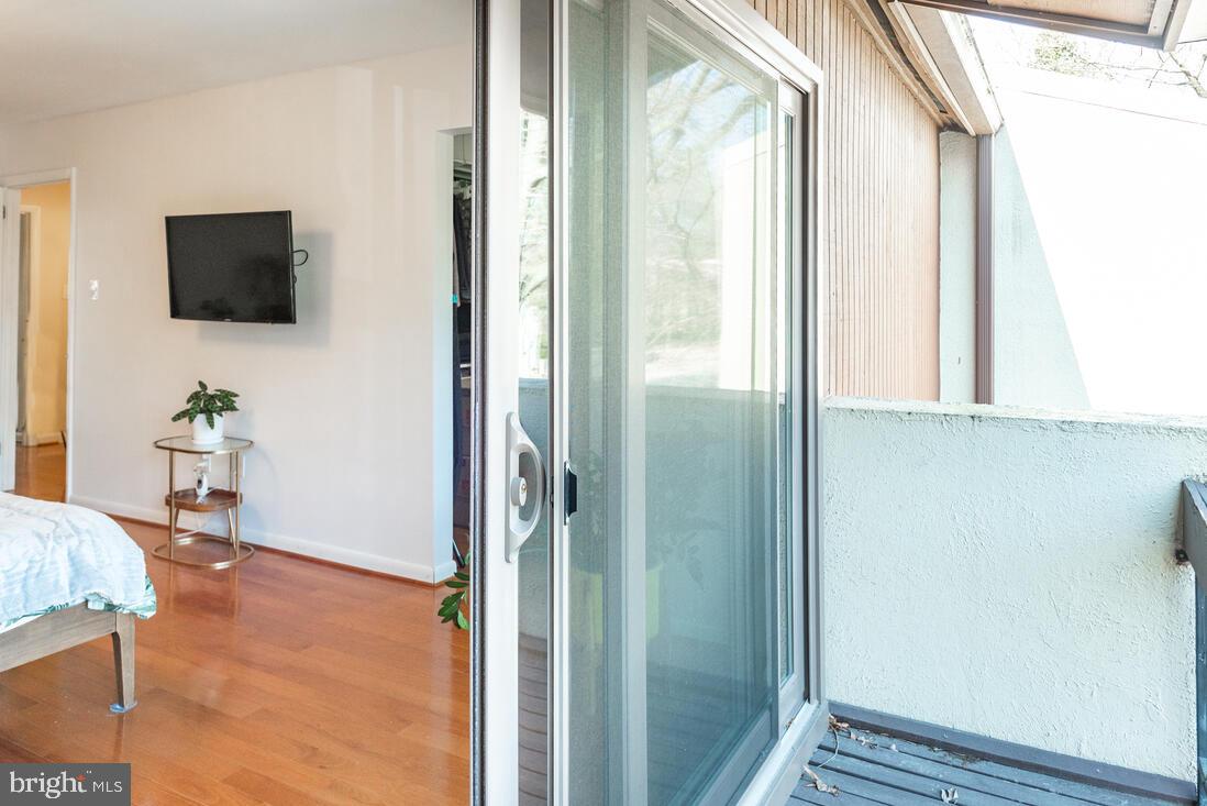 11621 Newbridge Court Reston, VA 20191 - Photo 24 of 43 Patio off primary bedroom