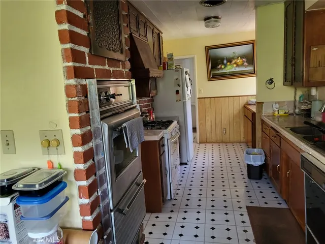 a room with furniture and wooden floor