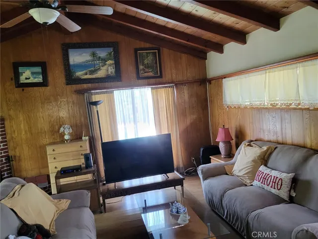 a view of a patio with chair and potted plants
